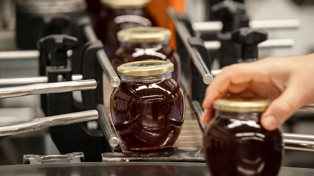 Honey that has been sealed in jars undergoes additional purification processes by bees, which significantly lowers its water content.